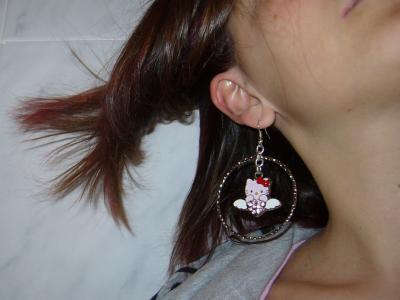 A ear, a hoop dangle and no face!