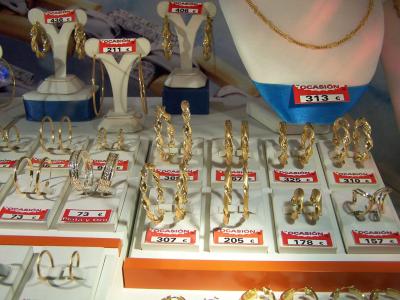 Heavy gold earrings