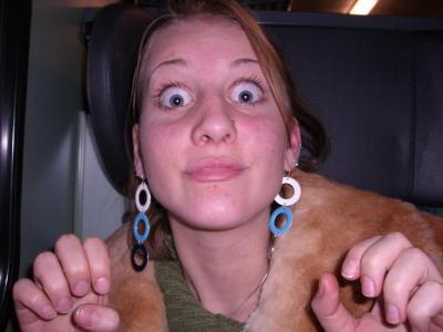 Hoop dangle lady makes big eyes