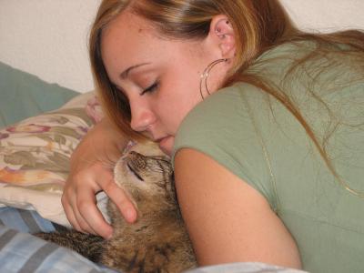 The cat like her hoops, too!