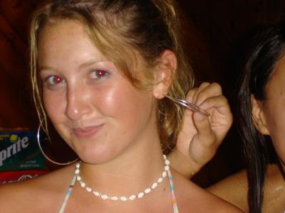 Pulling at her hoops!