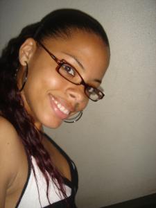 Wearing glasses and hoops!